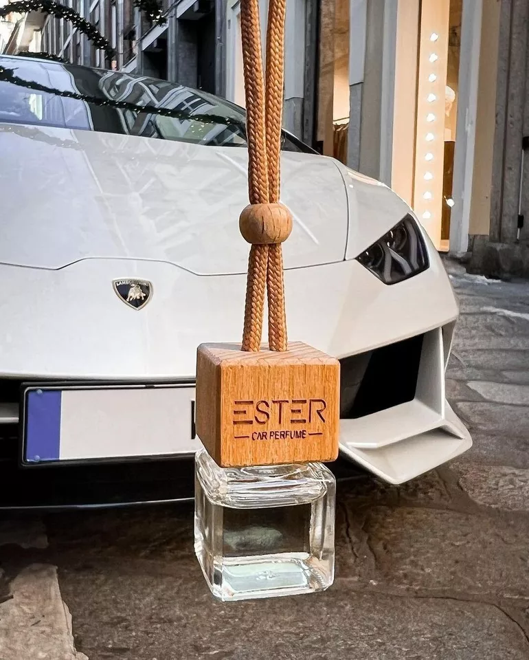 Premium Car Fragrance with Aromatherapy Containing Refined Scents with a rope near a Lamborghini